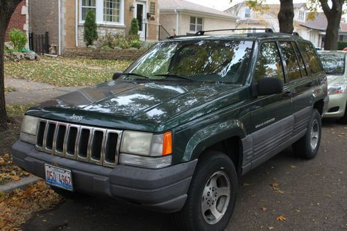 Forest green, automatic, 123000 miles, original owner