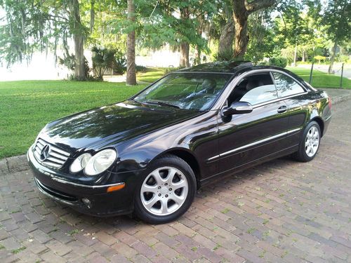 Black on black*sunroof*cd changer*auto*tint*new tires*must see