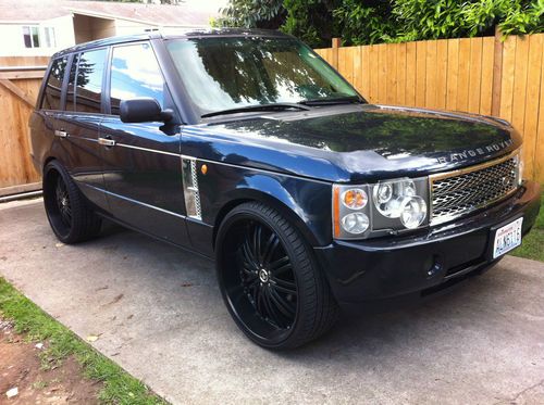 2003 range rover hse on 26s,in dash tv,leather,hid,air ride,stereo system.