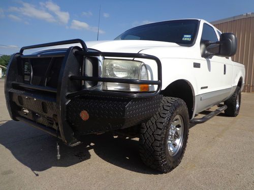 Awesome 2002 ford f250 7.3 turbo diesel 4x4 ext cab lifted beautiful clean title