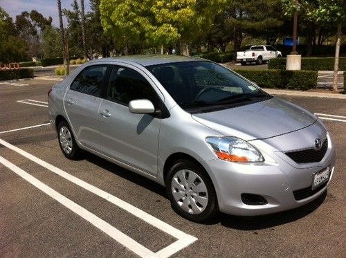 Toyota yaris 2010 4 door mint condition low mileage w/ factory warranty must see