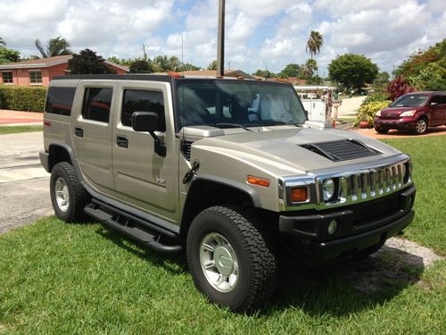 2004 hummer h2 beige/champagne