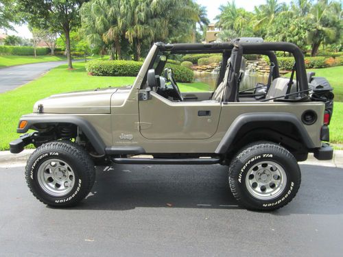 5 speed manual transmission soft top low miles great condition suspension lifted