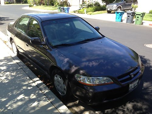 !99 honda accord. running. decent condition.