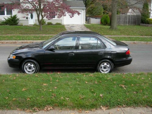 Toyota corolla ve only 113k runs and drives perfect 5spd no reserve