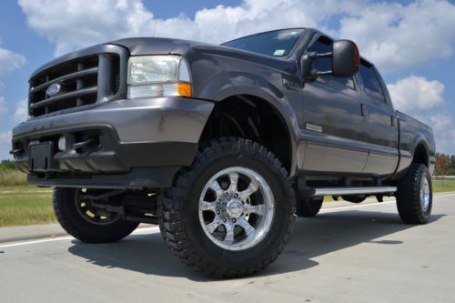 2003 ford f-250 crew cab lariat fx4 diesel lift  new tires