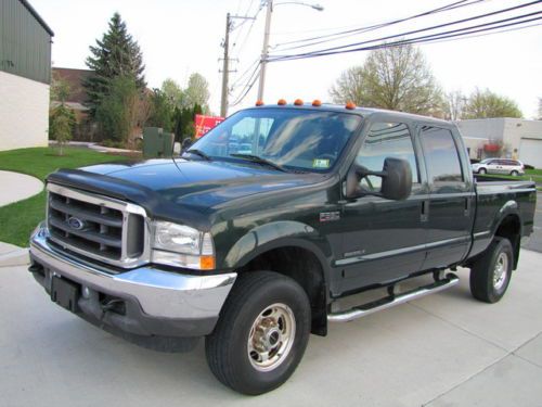 Luxury lariat crew cab turbo diesel 4x4 lifted off road truck !7.3 l diesel! 02