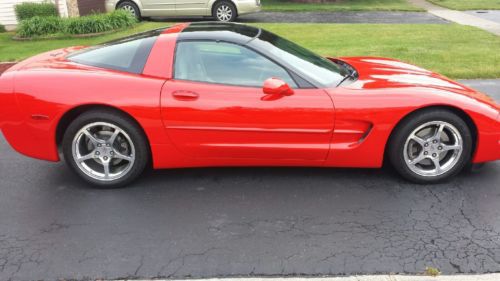 2004 torch red-grey leather- 9502 miles- 6 speed manual transmission