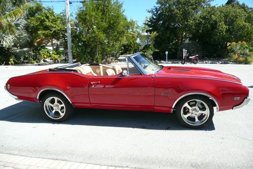 Custom cutlass 442 convertible just fully restored. 455 ci, red body.