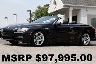 Black sapphire metallic auto awd only 7,306 miles like new perfect warranty