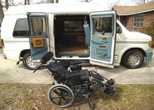 Handicap ford conv van by starcraft w/under van lift and free recline wheelchair