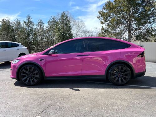 2022 tesla model x wrapped pink