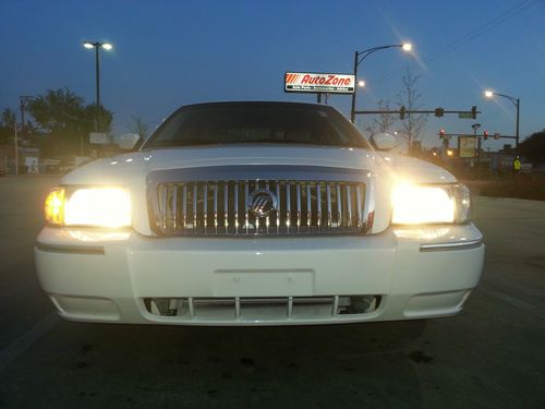 2010 mercury grand marquis ls,premium wheels,loaded,hwy miles,6 months warranty.