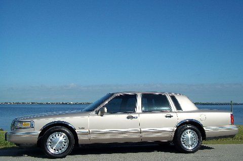 ...florida~low miles~signature series~leather~luxury~cd~rust free!!