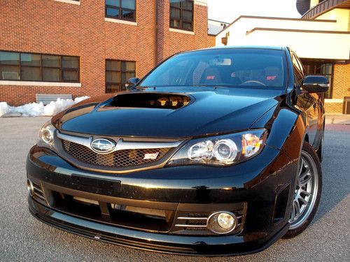 Sti 6 speed all wheel drive turbo black on black custom wheels