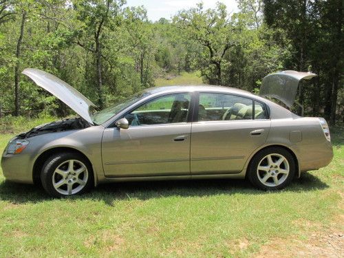 2003 nissan altima , v6, leather, very clean, 77k miles, one owner