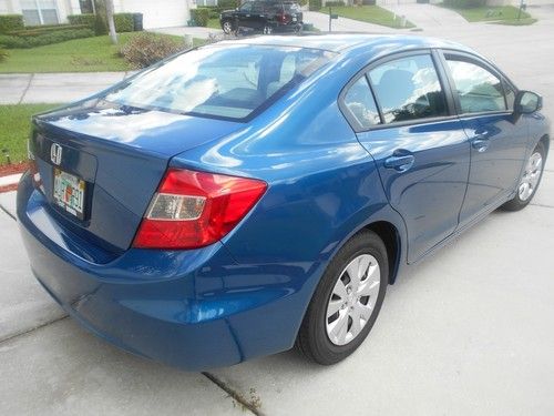 2012 honda civic lx sedan 4-door 1.8l.  less than 9500 miles!! clean title!