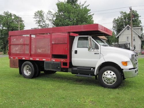 2006 ford f-750 reg cab only 26k w/ flatbed stack rack type bed cummins diesel