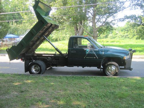 4x4 dodge ram dump truck low miles very good condition runs and drives great