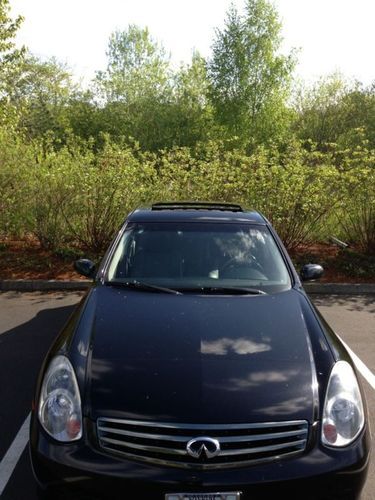 2005 infiniti g35 6-spd manual with sunroof, bose sound, spoiler, and more