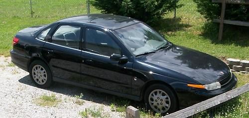 Saturn l200 4 cylinder, 4 door black