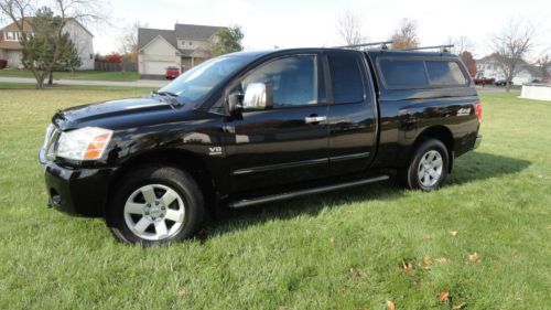 2004 nissan titan black 5.6 le 6 cd all options low reserve cap leather pickup