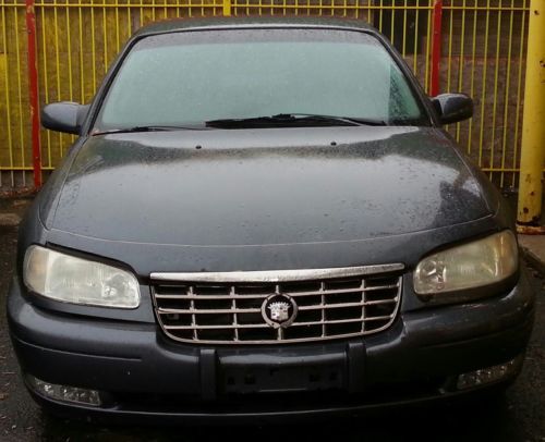 1997 cadillac catera  4-door 3.0l running for parts or repair only 81000 miles