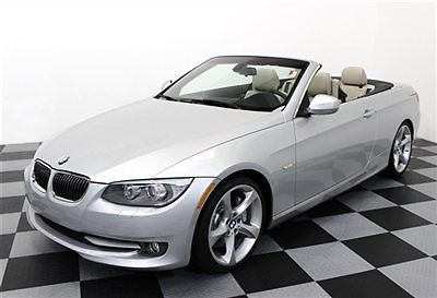 6 speed manual trans 11 335i convertible 13,000 miles sport premium 19s loaded