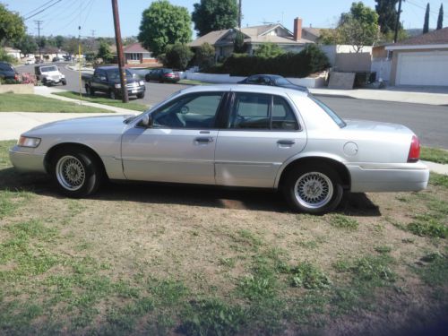 99 mercury grand marquis 4d sedan ls   (very clean &amp; extreme low miles)