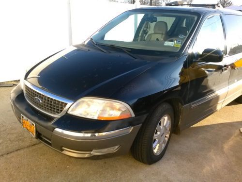 2003 ford windstar ltd  4 door fully loaded low miles 89.990 doin;t miss it