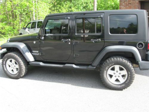 2010 jeep unlimited sport 3.8 v6 loaded, with new soft top 33 x 12.5 tires,nice