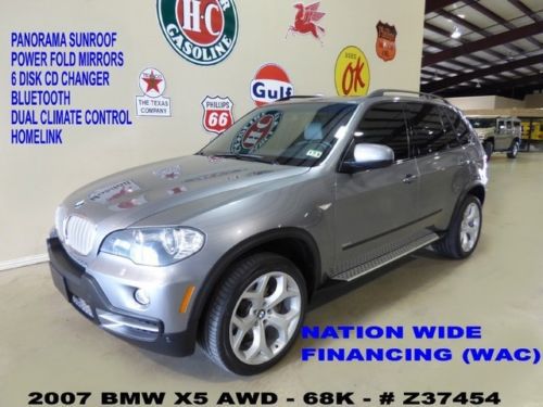 07 x5 awd,4.8i,pano roof,lth,b/t,6disk cd,park sensors,20in whls,68k,we finance!