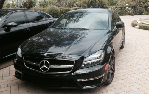 ***2012 mercedes cls63 amg black on black (very low miles)***