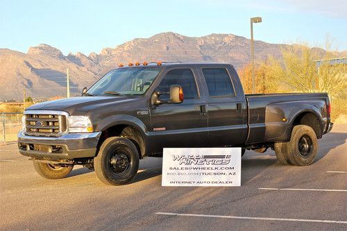 2004 ford f350 diesel 4x4 crew cab dually drw 4wd 102k miles runs well see video