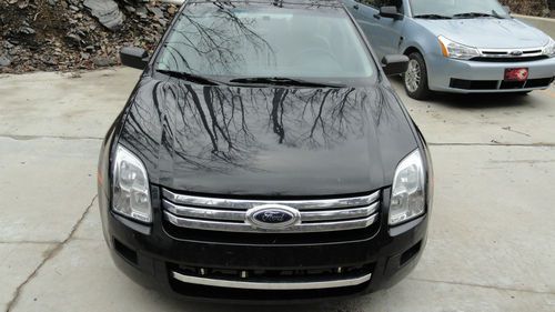 Price reduced!!!! - 2009 black ford fusion 4dr sedan