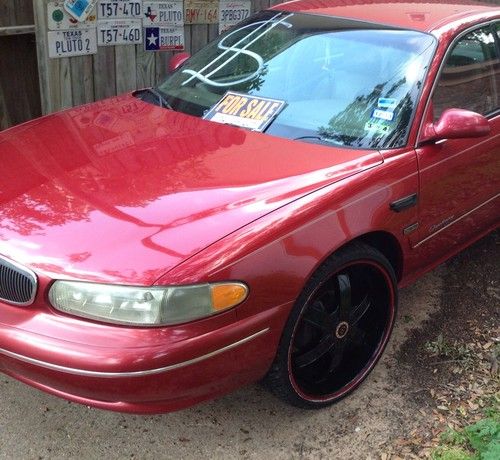 1998 buick century limited. 22" morphous rims and 2 15" q power subs and amp