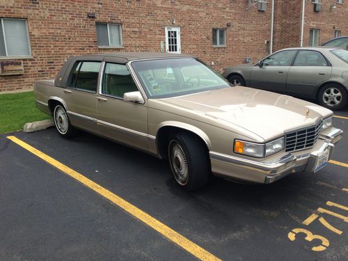 Cadillac deville 1993 golden trim