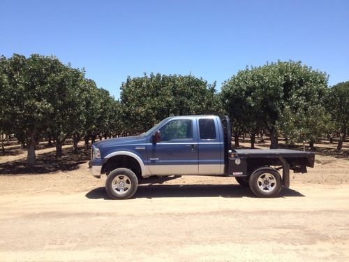 2006 ford f250 4x4 lariat 6.0l diesel w/ cm flatbed no reserve