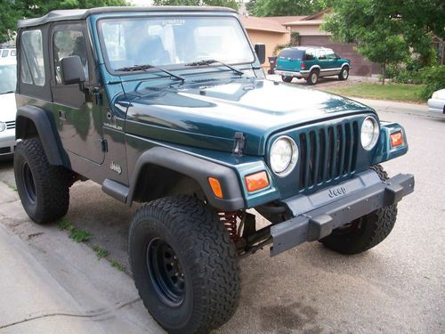 1998 jeep wrangler se, 5 speed,lifted, great shape, low miles, no reserve