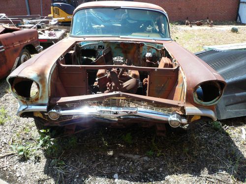 1957 chevrolet bel air 4 door sedan. great project or parts car. as is