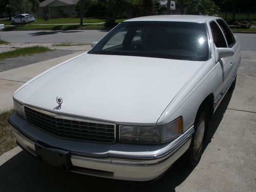 1996 cadillac deville, white, 4 dr sedan, fully garaged, low mileage,