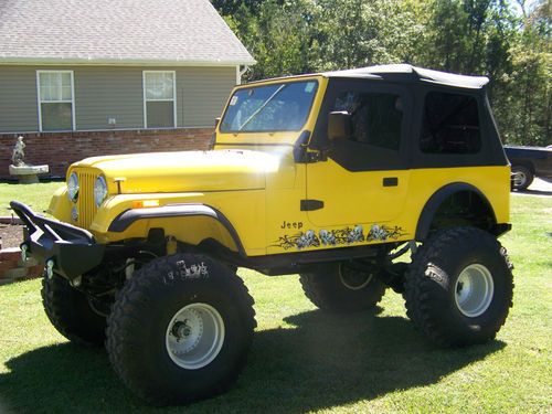 1985 jeep cj 7  with 4" skyjacker lift, brand new 39.5" super swamper irok tires