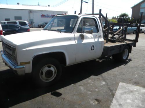 Stinger dumpster truck cardboard recycler