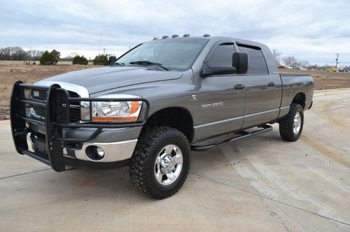 Mega cab 4x4 -- 5.9 cummins diesel -- ranch hand bumper -- very clean!