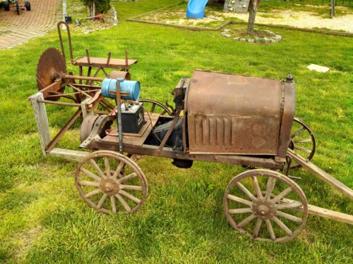 1920&#039;s model t ford power plant with saw attachment