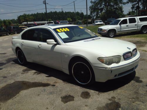 White 2004 bmw 745 li asanti 7-series sedan with 20&#039; crome and black bmw rims