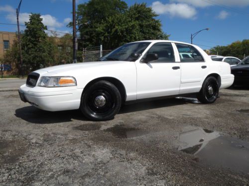 White p71 ex police 118k miles pw pl  psts am fm  nice