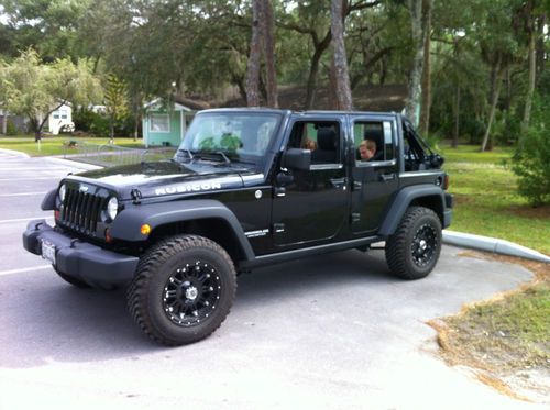 4dr ,black, rubicon, less than 15k miles, one owner, garage kept!!