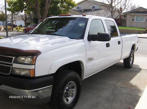 Chevy 2005 3500. 4wd crew cab duramax diesel, lng bd, srw silverado no reserve!