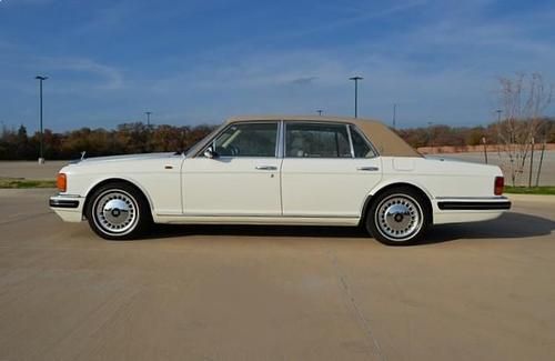 1997 rolls royce silver spur.. white with tan top